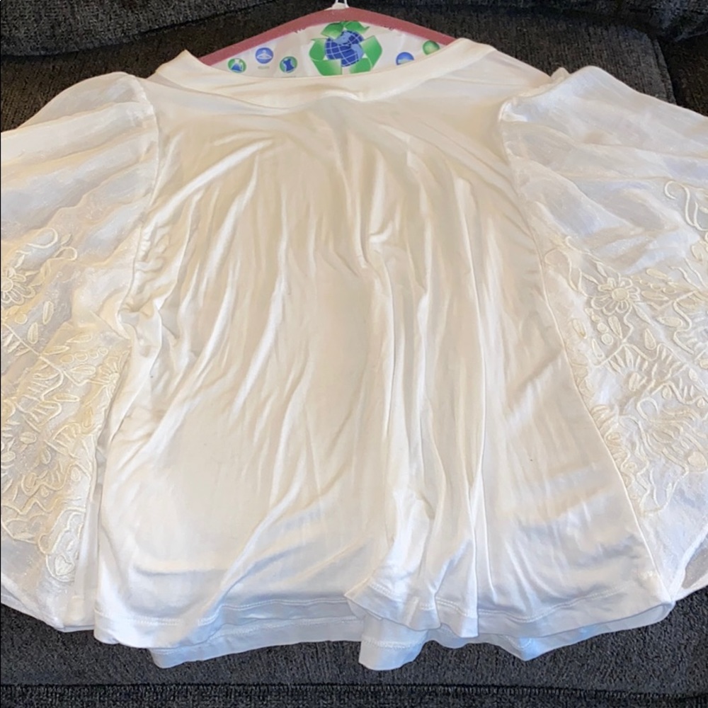 Embroidered sleeve white top